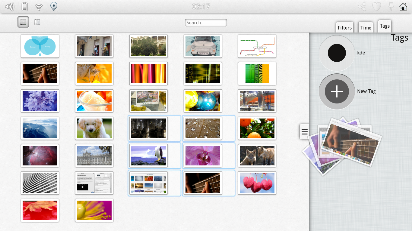 Plasma Active 3 file manager displaying images and tags